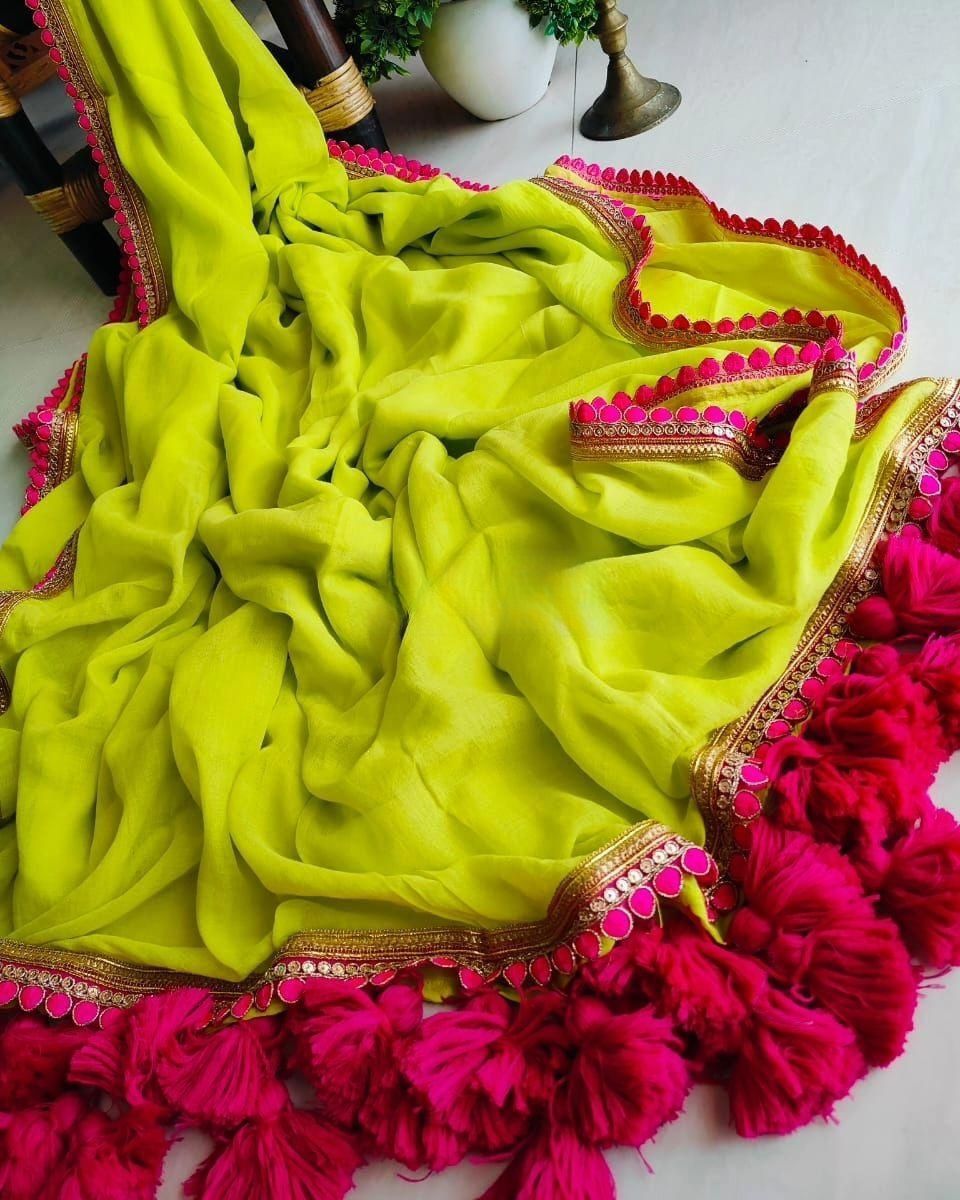 A designer saree crafted from genuine georgette fabric and boasts a stunning color Moksha Fashions