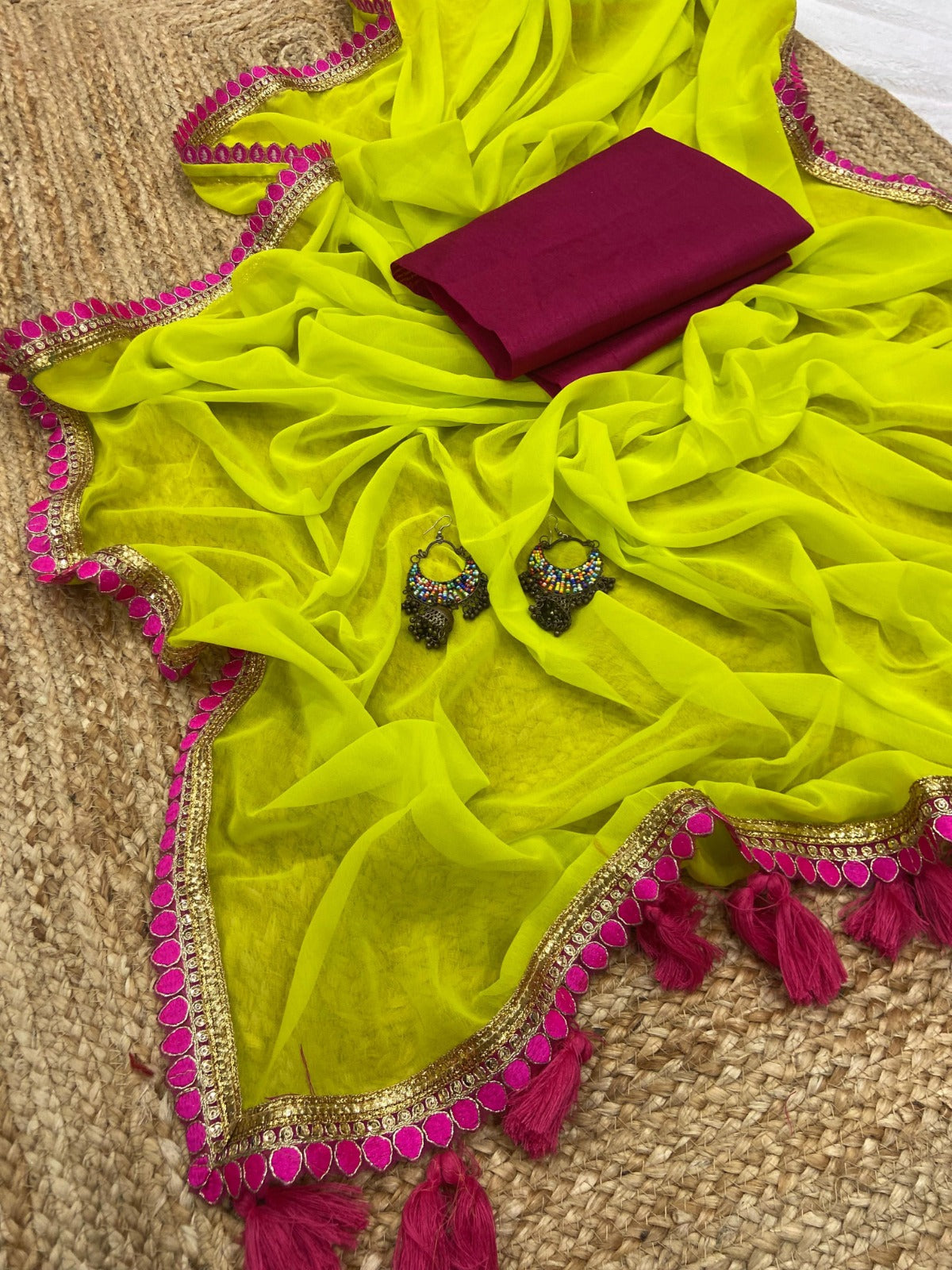 A designer saree crafted from genuine georgette fabric and boasts a stunning color Moksha Fashions