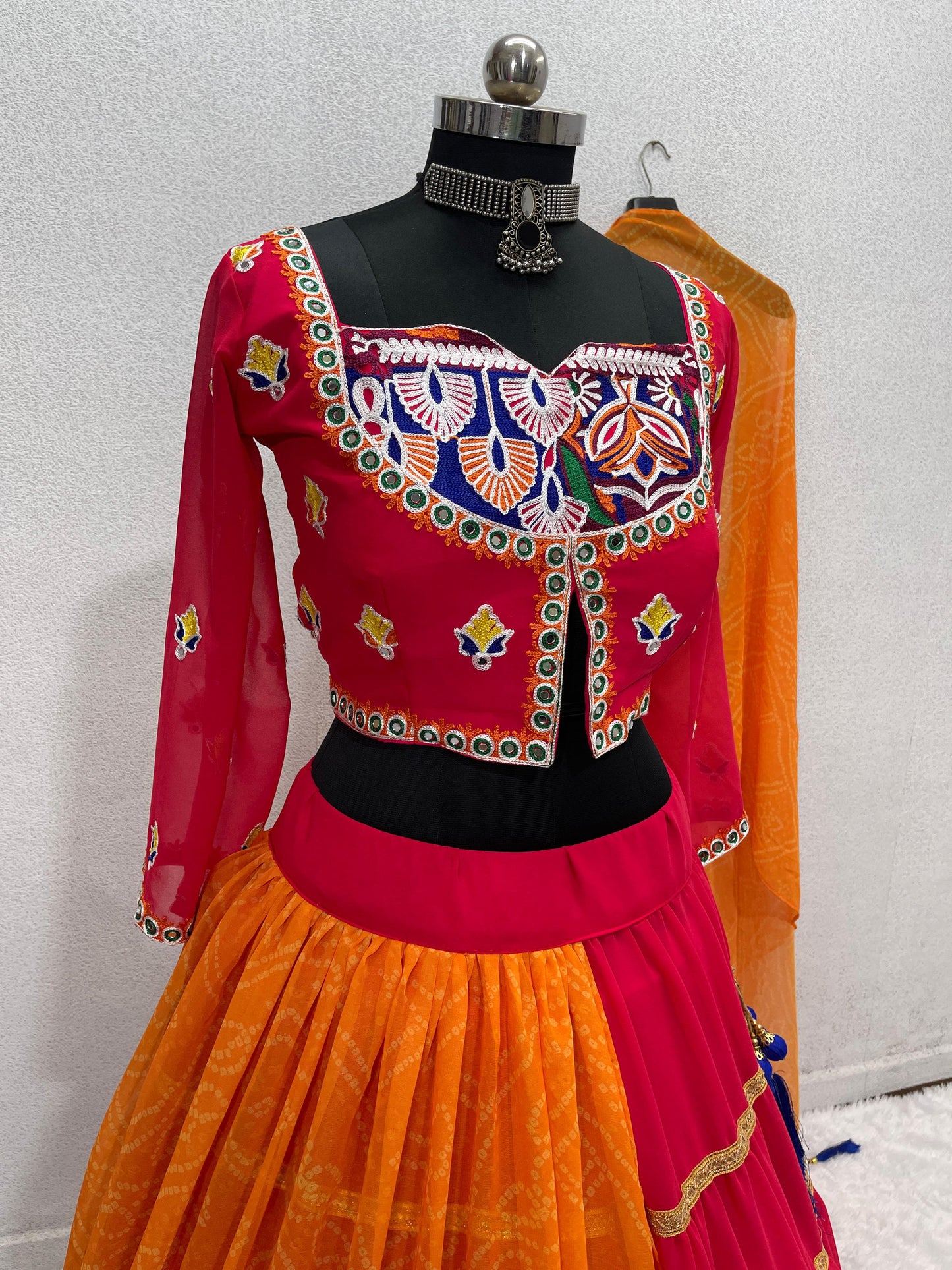 A NAVRATRI SPECIAL DIGITAL PRINT LEHENGA WITH REAL MIRROR WORK