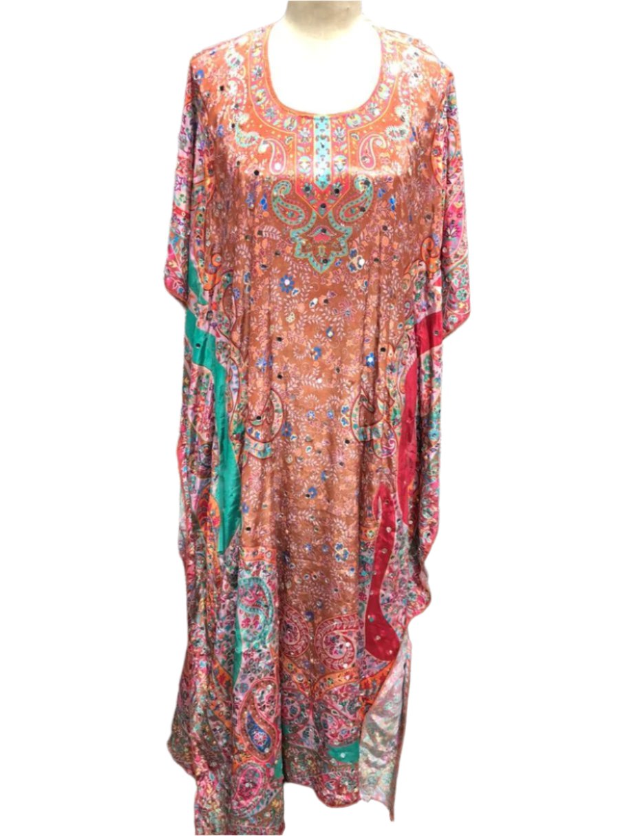 Embrace the timeless beauty and effortlessly stylish design of this kaftan