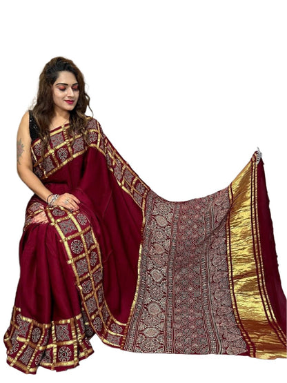 .Crafted From Pure Gajji Silk And Adorned Intricate Bandhej Patterns Experience The Luxurious Feel Of High-Quality Silk