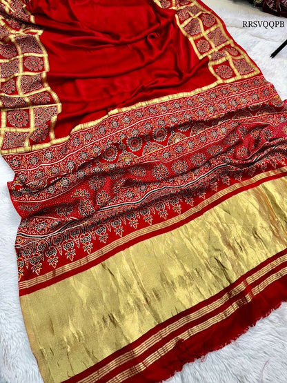 .Crafted From Pure Gajji Silk And Adorned Intricate Bandhej Patterns Experience The Luxurious Feel Of High-Quality Silk