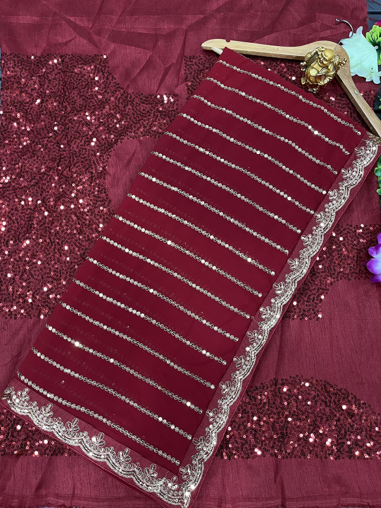 Add a Touch of Elegance With Maroon Sequence Saree