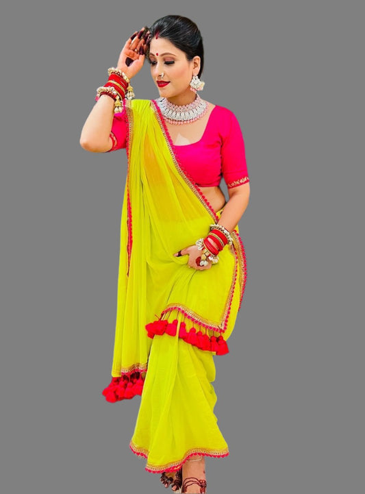 A designer saree crafted from genuine georgette fabric and boasts a stunning color